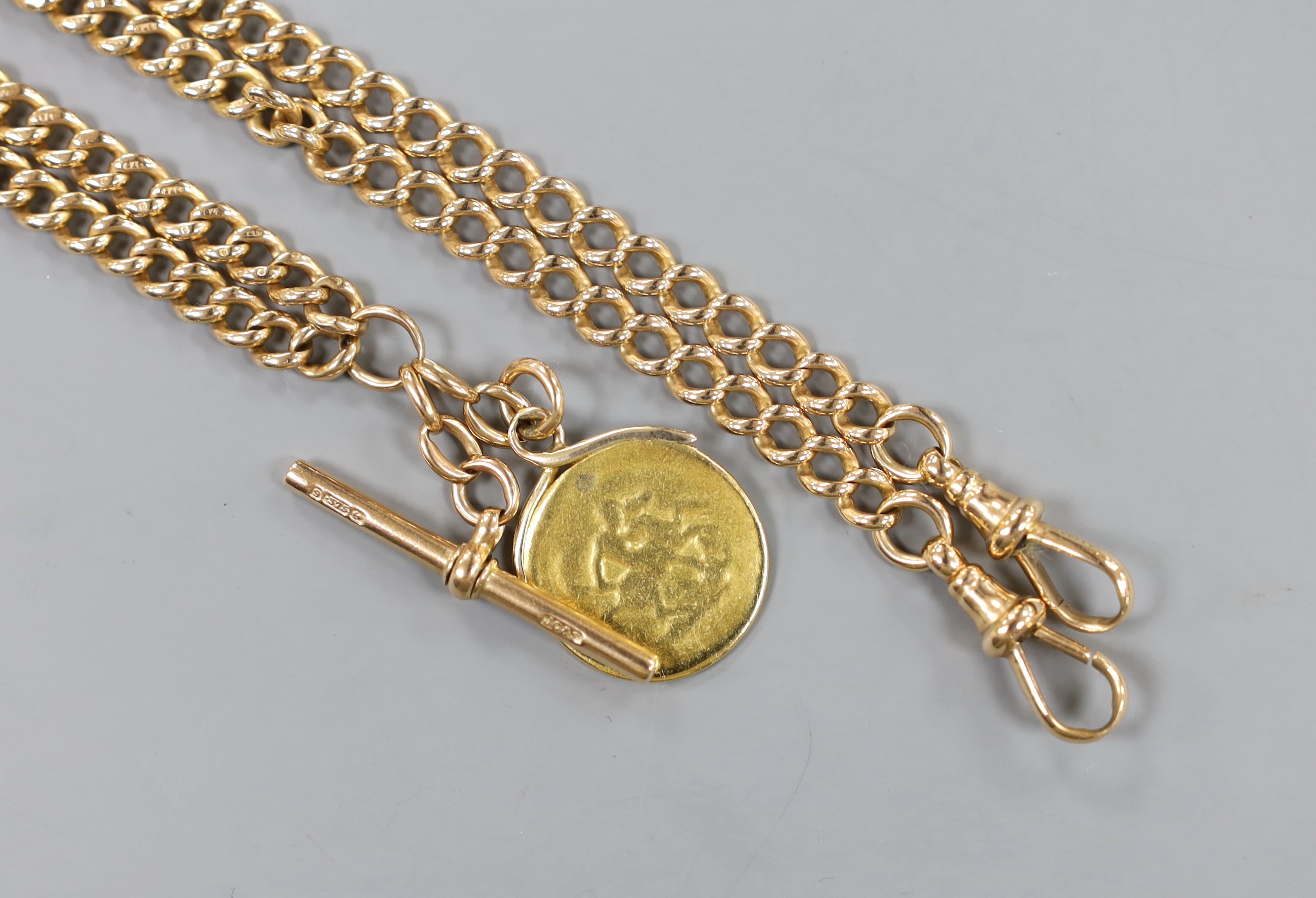 An early 20th century 9ct gold albert, 50cm, hung with a very worn sovereign, gross weight 49.6 grams.